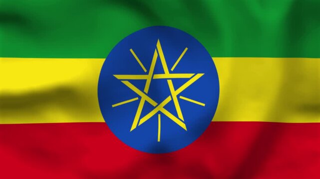 National flag of Ethiopia on wavy cloth. Features green, yellow, and red horizontal bands with the national pentagram emblem. Professional top-down view for African pride and national events.