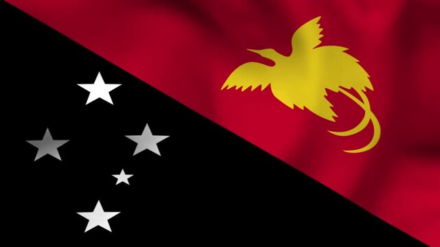 National flag of Papua New Guinea on wavy cloth. Features the bird of paradise and Southern Cross stars. Top-down view for national pride and independence day events.