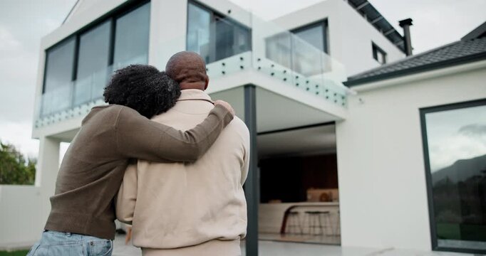 New home, couple and hug outdoor, love and happy for property investment with support together. African man, mature woman and back for real estate opportunity with embrace, mortgage and dream house