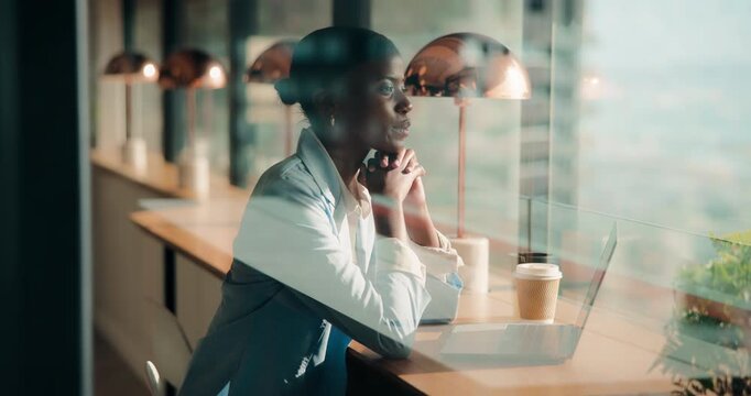 Coffee shop, business and black woman on laptop by window for planning, solution and finance. Restaurant, thinking and person on computer for financial report, research and remote work in cafe