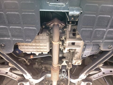 front undercarriage view of proton exora engine and transmission