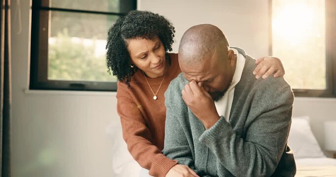 Sad, hug and couple in bedroom with grief, mourning or mental health at home. Stress, anxiety and wife with compassion, support and comforting person with depression, emotional crisis or crying
