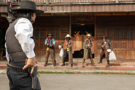 Showdown at the old western town gunfight scene desert environment dramatic viewpoint cinematic concept