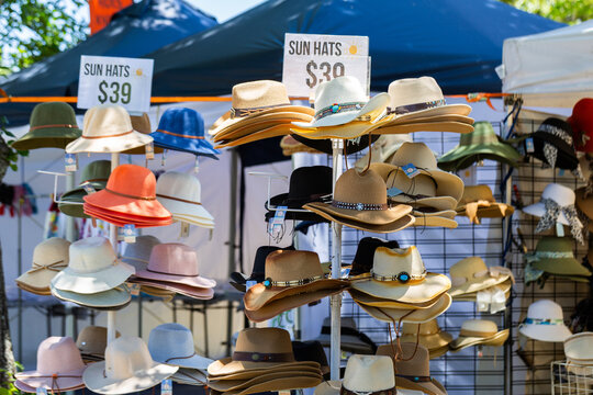 hats for sale at market stall