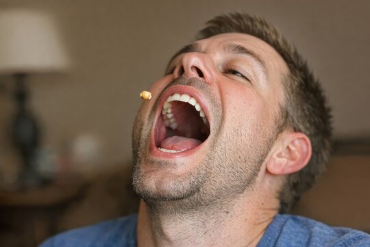 A man taking a break, smoking a cigarette