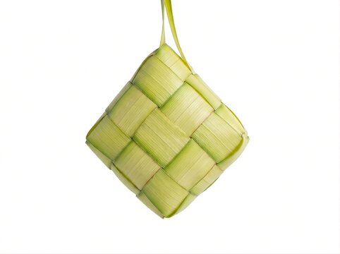 Traditional Indonesian Ketupat Rice Cake in Woven Palm Leaf Isolated on White Background