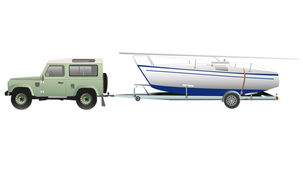 Voilier sue remorque de transport tract&eacute; par v&eacute;hicule de collection tout-terrain, de profil