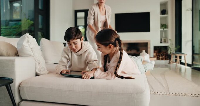 Fight, tablet and mom with children on sofa for online games, internet and discipline for sharing. Family, mother and kids with conflict on tech for cartoon choice, movies and videos with punishment