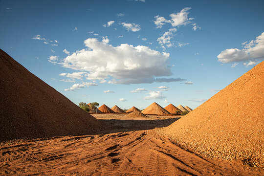 Gravel piles for building road base post flood damage