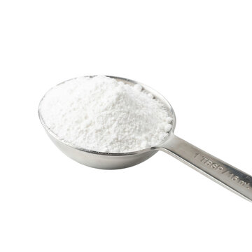 1 TBSP Stainless Steel Measuring Spoon With White Powder Isolated On White Background
