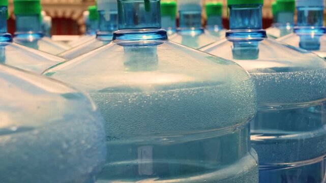 Large drinking water bottles delivery and transport logistics