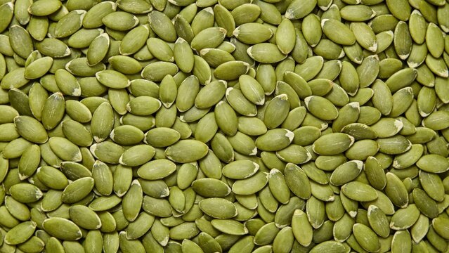 Raw green pumpkin seeds texture