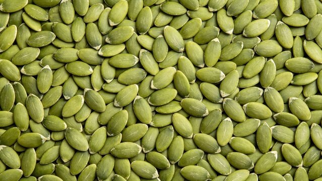 Raw green pumpkin seeds texture