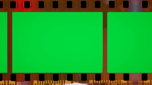 Celluloid film frame moving motion on green screen chroma key background. Simple negative slide boundary overlay video template. ui hq work art set format clip freelance cinema industry director raw