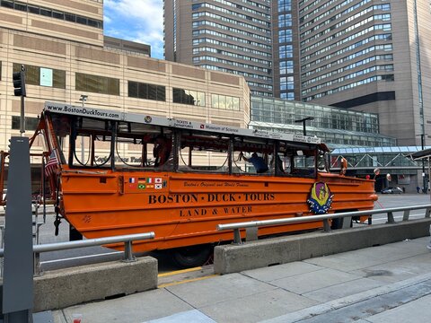 Original & World Famous Tourist Duck Harbor Tour Boats Amphibious Vehicle, Streets of Boston Near Copley Place Massachusetts, MA USA. Back Bay Neighborhood. Travel Vacation. Car, Truck Land Water Road