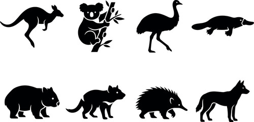 Fototapeta premium Black silhouettes of Australian animals kangaroo wallaby koala wombat echidna cockatoo and possum