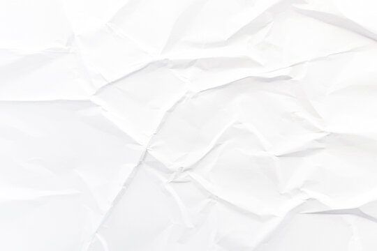 Abstract white crumpled paper texture background with soft folds