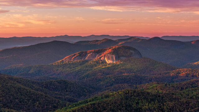 Autumn sunrise at the Blue Ridge Parkway Pounding Mill overlook with view towards Looking Glass Mountain