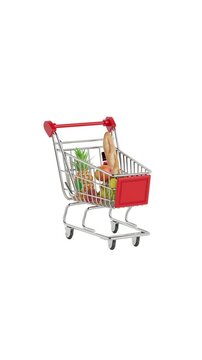 4k Resolution Vertical Video for Social Media: Grocery Shopping And Food Purchase Concept With Full Cart. Supermarket Trolley Animated Loaded With Fresh Fruits Bread And Milk On White Background 