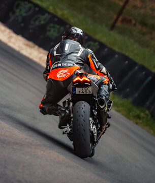 Regular training in Riga, Latvia, Bikernieki on 12-05-2026  Motorcyclist leaning into curve on twisty road