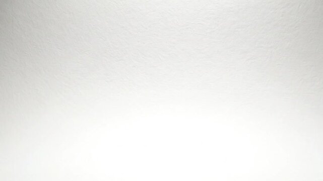 Subtle textured background with a soft gradient from light grey to white, perfect for design elements