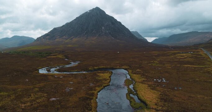 drone footage of River Etive with the iconic bridge on the Glencoe Mountain landscape