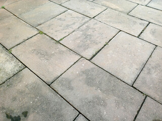 Fototapeta premium Gray concrete paving slabs texture background