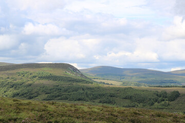 Obraz premium Mountain landscape with blue sky and clouds. Ireland