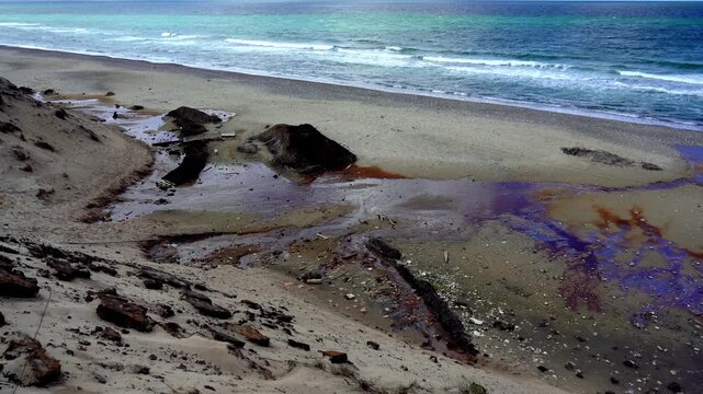 Eroded WWII Bunker Debris and Rust Pools on Beach, Nationalpark Thy, Denmark