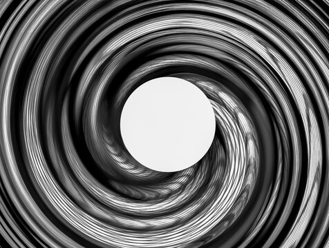 A spiral abstract design in black and white monochrome with copy space