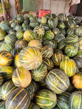 Fresh blewah melons at local market