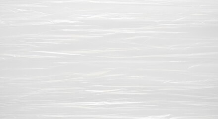 Obraz premium A high-quality translucent polyethylene plastic texture featuring subtle wrinkles and light reflections, ideal for modern packaging design, wrinkled, light, macro
