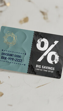 A stylized discount card with a teal and black design, showcasing a golden nest graphic and percentage symbol, symbolizing big savings and limited time offers.