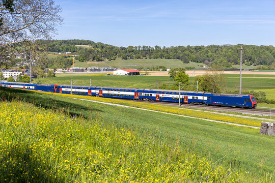 Double-decker commuter train of S-Bahn Zurich on line S9 public transport in Eglisau, Switzerland
