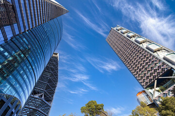 A dramatic low angle perspective of modern corporate business skyscrapers and financial district office buildings on Reforma Avenue in Mexico City Mexico © eskystudio