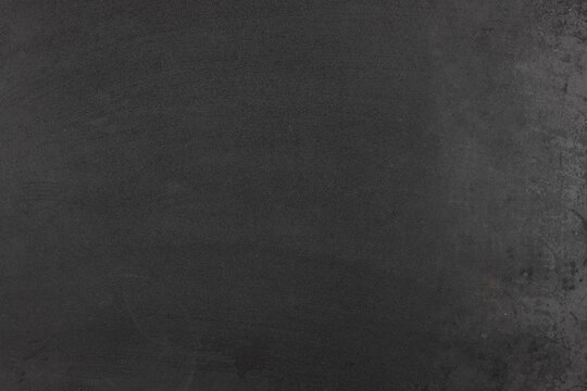Dark Gray or Black Textured Surface Background