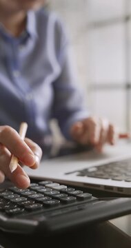 Calculation using a calculator and data entry into a computer