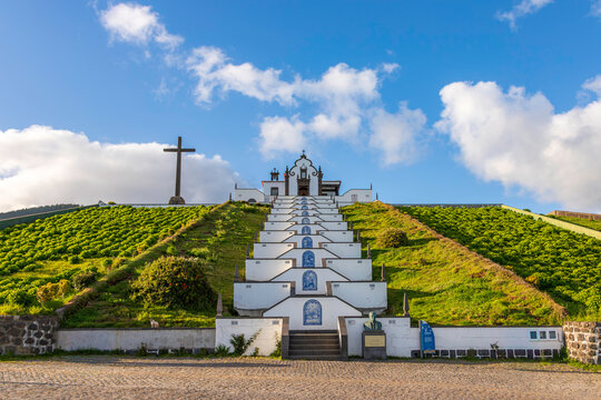 Staircase with azulejo tile panels leading up to the Ermida de Nossa Senhora da Paz church on Sao Miguel Island, Azores, Portugal.