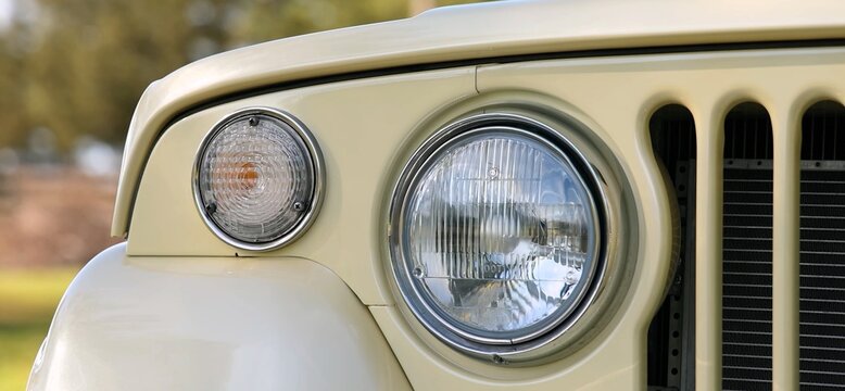 Jeep Jeepster Commando 1970, the legendary American off-road vehicle vintage car headlight