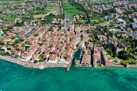Aerial view of the historic town of Lazise on the shores of Lake Garda with its medieval walls and Scaliger Castle Provincia di Verona, Veneto, Italy.
