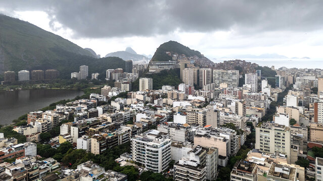 View of urban buildings and mountains in Ipanema, Rio de Janeiro, Brazil, under cloudy skies during the day