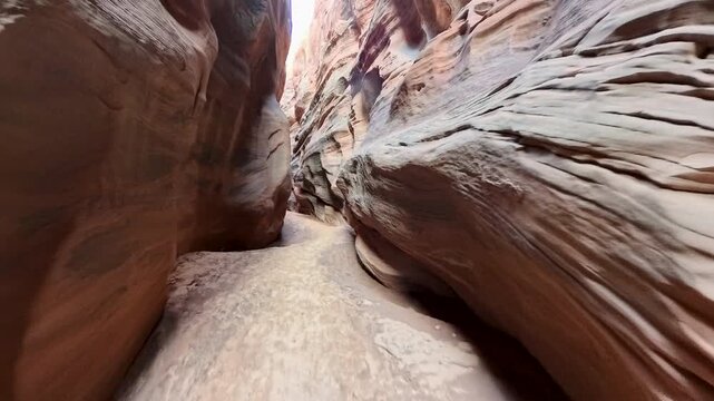 Hiking Through Red Rock Walls of Buckskin Gulch in Southern Utah