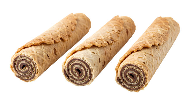 Three chocolate swiss rolls isolated on a transparent background