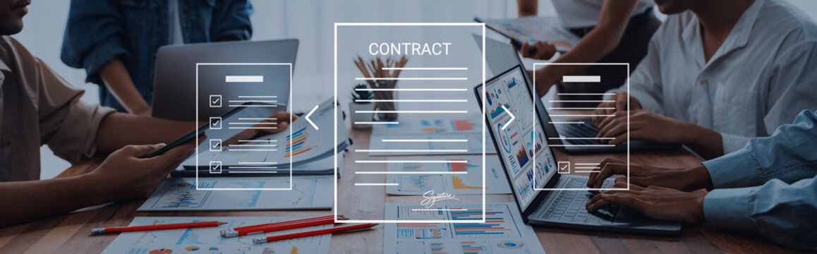 A diverse group of business professionals collaborating on contract terms at a conference table, utilizing laptops and documents to facilitate discussion and decision-making. Cyphers