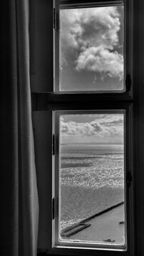 Vista para o mar pela janela em Salvador, Bahia, com a Ba&iacute;a de Todos-os-Santos | Sea view through a window in Salvador, Bahia, overlooking All Saints Bay
