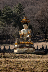 Obraz premium Large Buddha statue at Gwaneumsa Temple on Jeju Island, South Korea