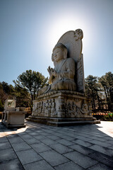 Fototapeta premium Buddhist monument and lanterns at Gwaneumsa Temple on Jeju Island, South Korea