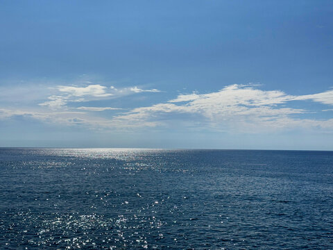 Calm sea and sunny blue sky.