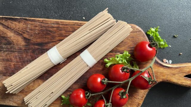 Buckwheat noodles raw food preparation lunch or dinner tasty organic snack fresh, tasty, gourmet food background on the table, rustic food, top view farm product copy space