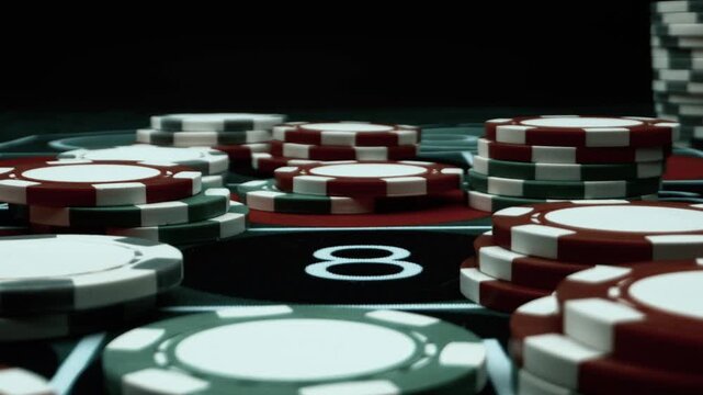 Close Up Casino Chips on Roulette Table Video Showing Gambling, Betting Strategy, Risk Taking, Luck and Problem Gambling Concept